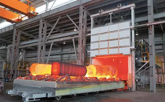 hot metal coming out of an industrial furnace